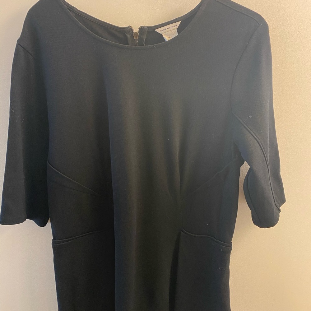 Black Club Monaco peplum top. Size M. Gently worn.